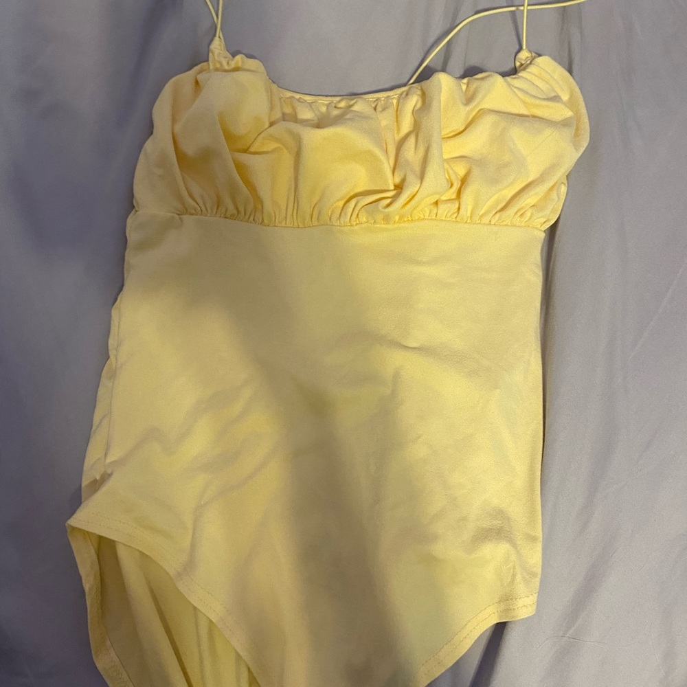 Cute yellow body suit
